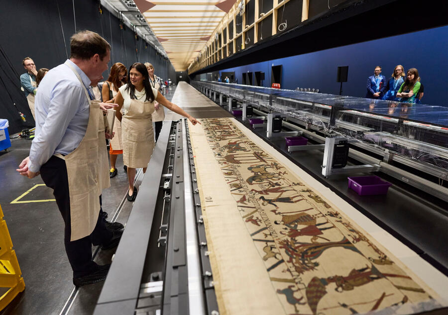 The Bayeux Tapestry positioned on the movable internal table during installation at the British Museum.